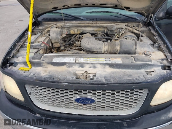 1999 Ford F-150 XL z VIN 2FTRX08L7XCA32562, wystawiony jako IAAI lot #42364671 z przebiegiem Nie podano mil oraz . Historia ofert i sprzedaży dostępna na DreamBid. Obrazek 10.