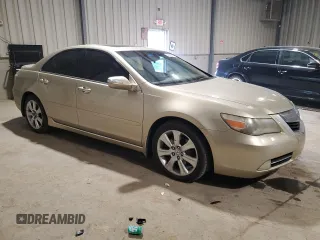 2009 Acura RL Technology z VIN JH4KB26699C002527, wystawiony jako Copart lot #54668255 z przebiegiem 143 644 mil mil oraz Szkoda całkowita • Salvage title. Historia ofert i sprzedaży dostępna na DreamBid. Obrazek 4.