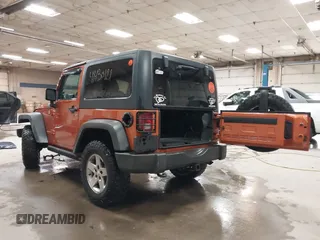 2011 Jeep Wrangler Rubicon with VIN 1J4BA6D15BL624268, listed as a IAAI auction lot 41430121 with 142,433 mi miles and . Bid and sale history available at carsss.com. Image 3.