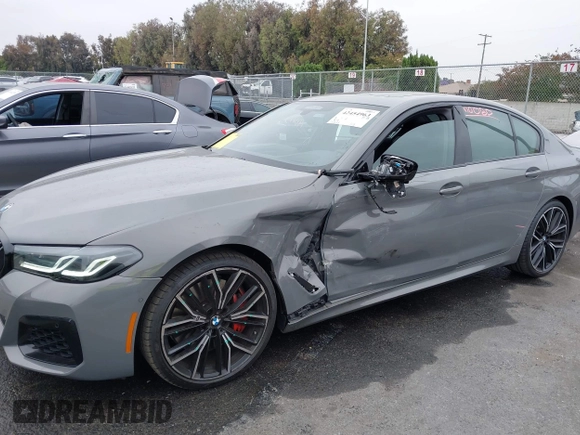 2022 BMW 5 Series M550i xDrive with VIN WBA13BK07NCL07995, listed as a IAAI auction lot 42454963 with 12,721 mi miles and . Bid and sale history available at DreamBid. Image 6.