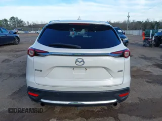 2016 Mazda CX-9 Grand Touring z VIN JM3TCADY4G0124588, wystawiony jako IAAI lot #41192549 z przebiegiem 161 272 mil mil oraz . Historia ofert i sprzedaży dostępna na DreamBid. Obrazek 16.
