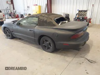 2000 Pontiac Firebird Firebird z VIN 2G2FS32KXY2146392, wystawiony jako IAAI lot #42506629 z przebiegiem 161 077 mil mil oraz . Historia ofert i sprzedaży dostępna na DreamBid. Obrazek 3.