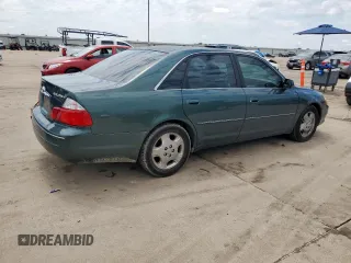 2003 Toyota Avalon XL z VIN 4T1BF28BX3U310285, wystawiony jako Copart lot #57664375 z przebiegiem 179 727 mil mil oraz Szkoda całkowita • Salvage title. Historia ofert i sprzedaży dostępna na DreamBid. Obrazek 3.