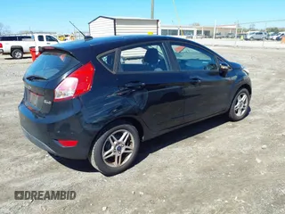 2017 Ford Fiesta SE with VIN 3FADP4EJ5HM164039, listed as a IAAI auction lot 41769636 with 56,778 mi miles. Bid and sale history available at carsss.com. Image 4.