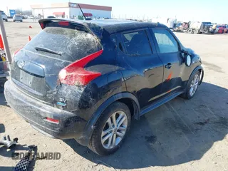 2014 Nissan Juke S with VIN JN8AF5MR1ET450940, listed as a IAAI auction lot 38801607 with 157,565 mi miles. Bid and sale history available at carsss.com. Image 4.