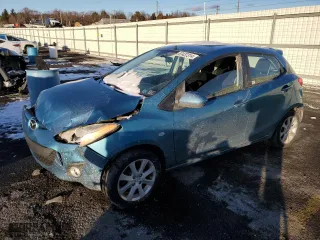 2012 Mazda Mazda2 Touring with VIN JM1DE1LZ8C0150753, listed as a Copart auction lot 87437314 with 0 mi miles and Salvage Title. Bid and sale history available at carsss.com. Image 1.