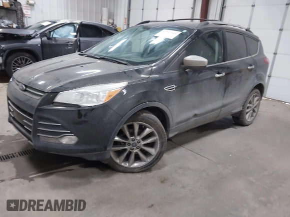 2014 Ford Escape SE with VIN 1FMCU9GXXEUD09124, listed as a IAAI auction lot 41747925 with 147,996 mi miles and . Bid and sale history available at DreamBid. Image 2.