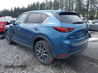 2017 Mazda CX-5 Grand Touring with VIN JM3KFADL5H0100146, listed as a IAAI auction lot 41997181 with 80,071 mi miles. Bid and sale history available at carsss.com. Image 3.