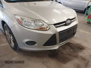 2013 Ford Focus SE z VIN 1FADP3F24DL277767, wystawiony jako IAAI lot #41562390 z przebiegiem 183 322 mil mil oraz . Historia ofert i sprzedaży dostępna na DreamBid. Obrazek 6.