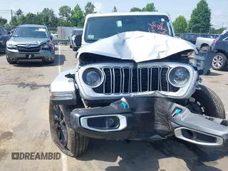 2024 Jeep Wrangler Sahara with VIN 1C4RJXP60RW292136, listed as a IAAI auction lot 42280063 with 26,701 mi miles and . Bid and sale history available at DreamBid. Image 6.
