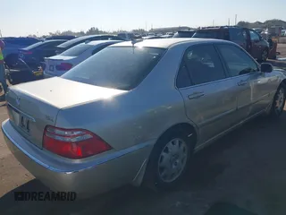 2004 Acura RL w/Navigation System with VIN JH4KA96674C007830, listed as a IAAI auction lot 41146234 with 80,611 mi miles. Bid and sale history available at carsss.com. Image 4.