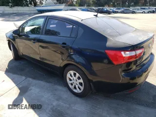 2014 Kia Rio LX with VIN KNADM4A35E6407058, listed as a Copart auction lot 72997044 with 76,215 mi miles and Salvage Title. Bid and sale history available at DreamBid. Image 2.