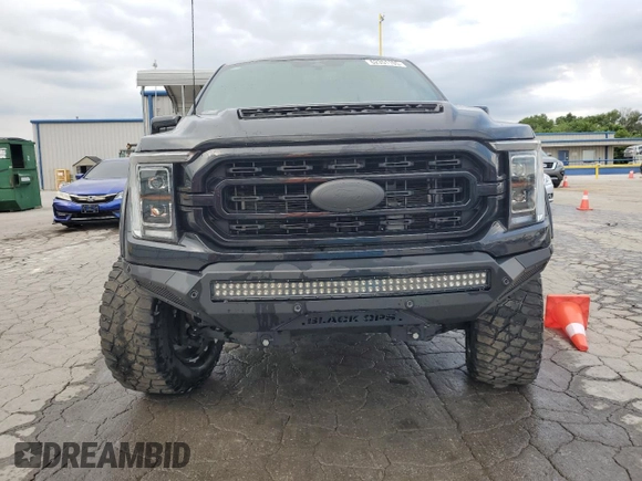 2023 Ford F-150 XL with VIN 1FTFW1E5XPKD88243, listed as a Copart auction lot 62351105 with 29,046 mi miles and Salvage title. Bid and sale history available at DreamBid. Image 5.