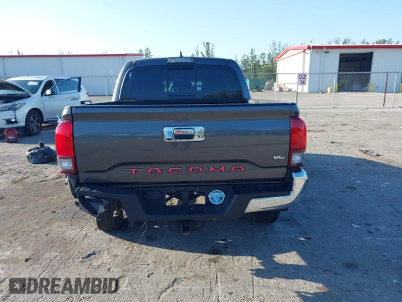 2018 Toyota Tacoma SR5 with VIN 3TMAZ5CN4JM069965, listed as a IAAI auction lot 41798238 with 124,619 mi miles and . Bid and sale history available at DreamBid. Image 17.