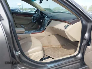 2012 Cadillac CTS Luxury with VIN 1G6DE5E56C0132613, listed as a IAAI auction lot 42116862 with 81,617 mi miles and . Bid and sale history available at DreamBid. Image 5.