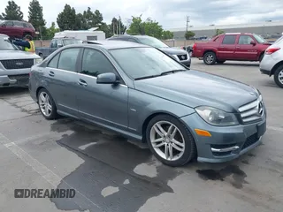 2012 Mercedes-Benz C-Class C 250 Sport with VIN WDDGF4HB5CA668018, listed as a IAAI auction lot 42115482 with 90,704 mi miles. Bid and sale history available at carsss.com. Image 1.