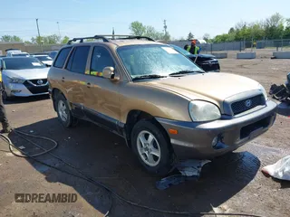 2002 Hyundai Santa Fe GLS z VIN KM8SC73DX2U270948, wystawiony jako IAAI lot #42157089 z przebiegiem 170 824 mil mil oraz . Historia ofert i sprzedaży dostępna na DreamBid. Obrazek 1.