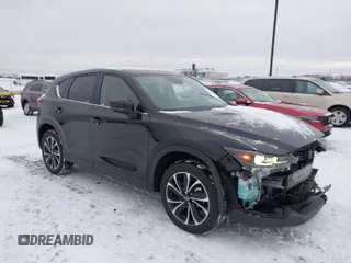 2023 Mazda CX-5 2.5 S Premium Plus Package with VIN JM3KFBEM6P0172890, listed as a IAAI auction lot 41312358 with 19,574 mi miles. Bid and sale history available at carsss.com. Image 1.