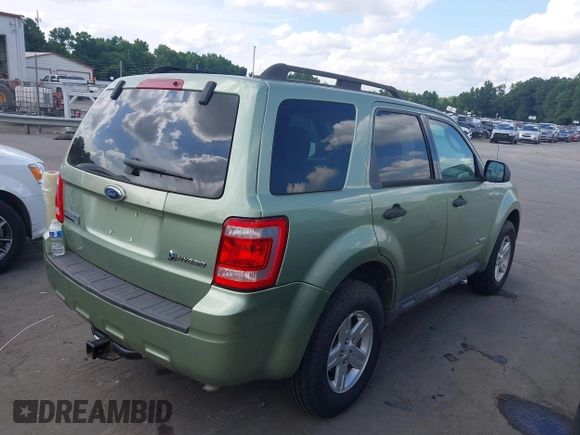 2009 Ford Escape Hybrid with VIN 1FMCU49349KA35580, listed as a IAAI auction lot 42720544 with 95,630 mi miles and . Bid and sale history available at DreamBid. Image 4.