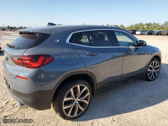 2021 BMW X2 xDrive28i with VIN WBXYJ1C04M5S07696, listed as a Copart auction lot 73412384 with 35,004 mi miles and Salvage Title. Bid and sale history available at carsss.com. Image 3.