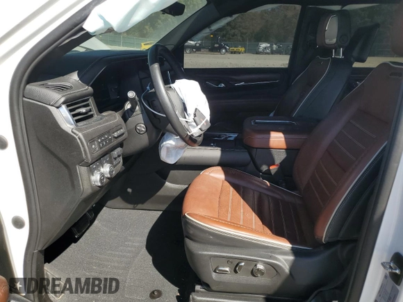 2023 GMC Yukon Denali Ultimate with VIN 1GKS2EKL0PR132029, listed as a Copart auction lot 77234034 with 58,071 mi miles and Salvage Title. Bid and sale history available at carsss.com. Image 7.