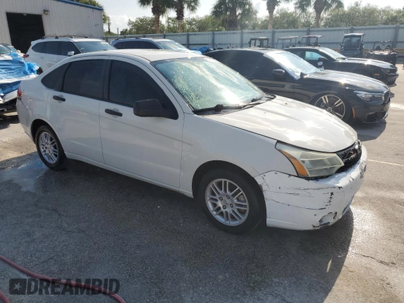2010 Ford Focus SE with VIN 1FAHP3FN1AW168723, listed as a Copart auction lot 53871655 with 226,703 mi miles and Salvage Title. Bid and sale history available at DreamBid. Image 4.