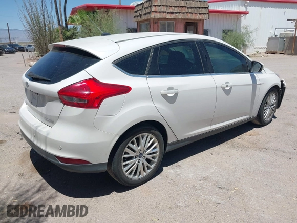 2016 Ford Focus Titanium with VIN 1FADP3N27GL319497, listed as a IAAI auction lot 42385359 with Not provided miles and . Bid and sale history available at DreamBid. Image 4.