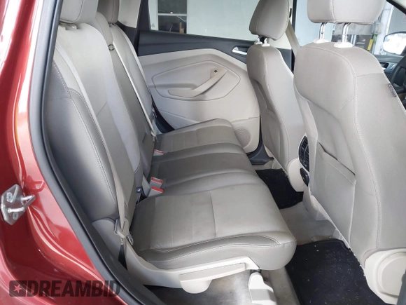 2016 Ford Escape SE with VIN 1FMCU0GX1GUB12017, listed as a IAAI auction lot 40760172 with 174,572 mi miles. Bid and sale history available at carsss.com. Image 8.