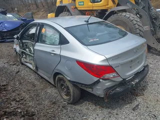 2014 Hyundai Accent GLS with VIN KMHCT4AE5EU597325, listed as a IAAI auction lot 42005445 with 1 mi miles. Bid and sale history available at carsss.com. Image 3.
