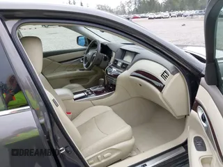 2015 Infiniti Q70 with VIN JN1BY1ARXFM562111, listed as a IAAI auction lot 42473521 with 123,212 mi miles and . Bid and sale history available at DreamBid. Image 5.