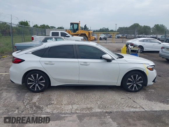 2023 Honda Civic EX-L with VIN 19XFL1H70PE014510, listed as a IAAI auction lot 42395890 with 14,163 mi miles and . Bid and sale history available at DreamBid. Image 13.