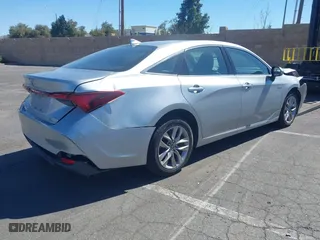 2019 Toyota Avalon Hybrid Limited with VIN 4T1B21FB1KU003112, listed as a IAAI auction lot 41610307 with 169,569 mi miles. Bid and sale history available at carsss.com. Image 4.
