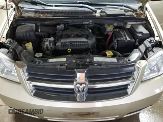 2010 Dodge Grand Caravan Crew with VIN 2D4RN6DX7AR463122, listed as a Copart auction lot 48768635 with 102,497 mi miles and Salvage Title. Bid and sale history available at DreamBid. Image 12.