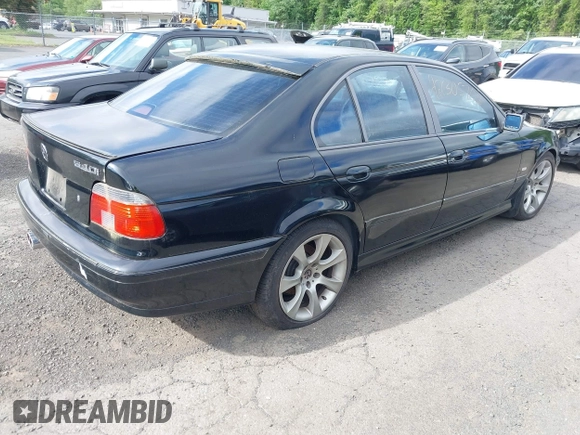1997 BMW 5 Series 540i z VIN WBADE5324VBV92704, wystawiony jako IAAI lot #42305703 z przebiegiem 202 371 mil mil oraz . Historia ofert i sprzedaży dostępna na DreamBid. Obrazek 4.