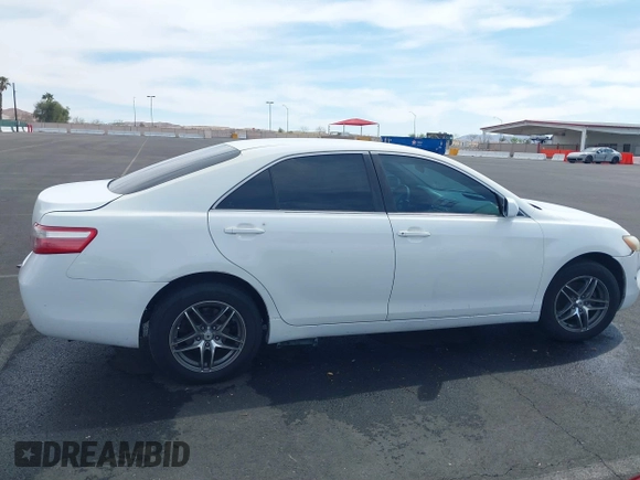 2009 Toyota Camry with VIN 4T1BE46K99U810691, listed as a IAAI auction lot 41809157 with 132,234 mi miles. Bid and sale history available at carsss.com. Image 12.