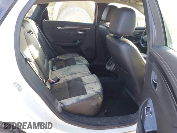 2016 Chevrolet Impala LT with VIN 2G1115S36G9185895, listed as a IAAI auction lot 41649718 with 101,002 mi miles and . Bid and sale history available at DreamBid. Image 8.