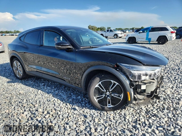 2022 Ford Mustang Mach-E Select with VIN 3FMTK1RM7NMA62546, listed as a Copart auction lot 59795205 with 99,266 mi miles and Salvage title. Bid and sale history available at DreamBid. Image 4.