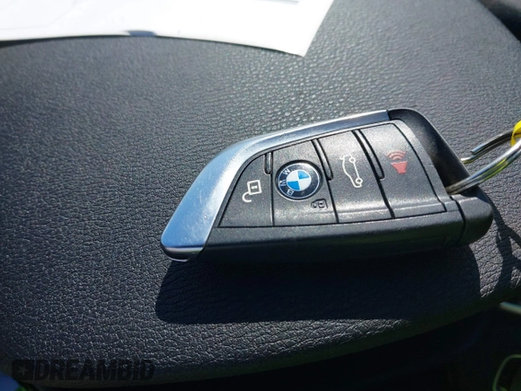 2019 BMW X1 xDrive28i with VIN WBXHT3C58K5N05523, listed as a IAAI auction lot 41752675 with 63,861 mi miles. Bid and sale history available at carsss.com. Image 11.