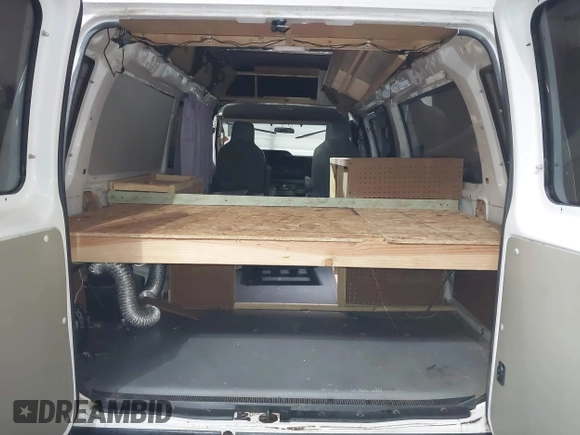 2011 Ford Econoline Cargo Commercial with VIN 1FTNS1EW0BDA60746, listed as a IAAI auction lot 41346661 with 117,363 mi miles. Bid and sale history available at carsss.com. Image 19.