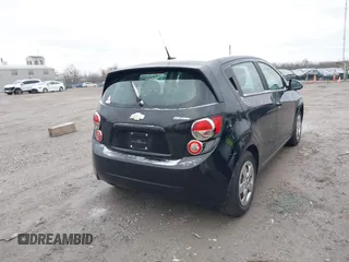 2014 Chevrolet Sonic LS with VIN 1G1JA6SH6E4139131, listed as a IAAI auction lot 41727625 with 97,241 mi miles and . Bid and sale history available at DreamBid. Image 4.