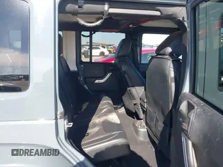 2015 Jeep Wrangler Unlimited Rubicon with VIN 1C4BJWFG7FL525724, listed as a IAAI auction lot 41394059 with 132,058 mi miles. Bid and sale history available at carsss.com. Image 8.