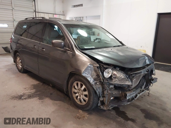 2010 Honda Odyssey EX-L with VIN 5FNRL3H7XAB080170, listed as a IAAI auction lot 41241879 with 221,272 mi miles. Bid and sale history available at carsss.com. Image 1.