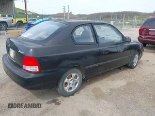 2000 Hyundai Accent z VIN KMHCF35G5YU017900, wystawiony jako IAAI lot #42063663 z przebiegiem 170 283 mil mil oraz . Historia ofert i sprzedaży dostępna na DreamBid. Obrazek 4.