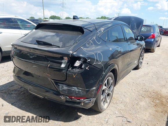 2023 Ford Mustang Mach-E Premium with VIN 3FMTK3SU2PMA83720, listed as a IAAI auction lot 42697799 with 38,277 mi miles and . Bid and sale history available at DreamBid. Image 4.