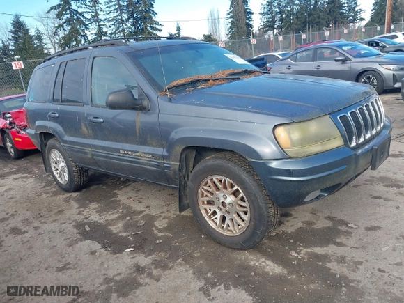 2003 Jeep Grand Cherokee Limited with VIN 1J8GW58S93C589285, listed as a IAAI auction lot 41467743 with 231,614 mi miles. Bid and sale history available at carsss.com. Image 1.