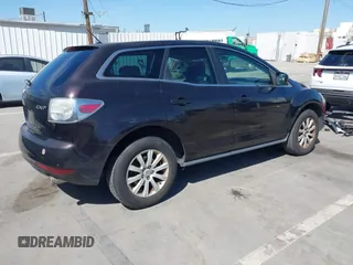 2010 Mazda CX-7 Sport with VIN JM3ER2WM3A0342696, listed as a IAAI auction lot 42024862 with 257,564 mi miles. Bid and sale history available at carsss.com. Image 4.