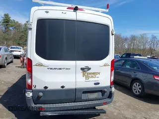2015 Ford Transit Cargo z VIN 1FTNR2CM8FKB24259, wystawiony jako IAAI lot #42084952 z przebiegiem 124 520 mil mil oraz . Historia ofert i sprzedaży dostępna na DreamBid. Obrazek 16.
