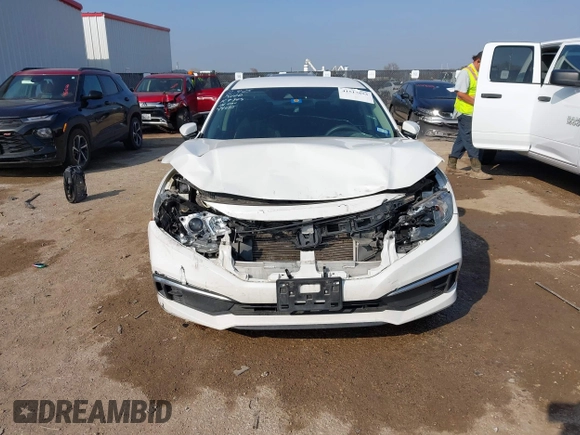 2020 Honda Civic LX z VIN 2HGFC2F68LH565560, wystawiony jako IAAI lot #41517853 z przebiegiem 96 832 mil mil oraz . Historia ofert i sprzedaży dostępna na DreamBid. Obrazek 12.