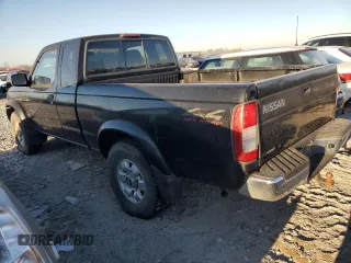 1999 Nissan Frontier XE with VIN 1N6ED26Y4XC322021, listed as a Copart auction lot 82690214 with 102,758 mi miles and Clean title. Bid and sale history available at DreamBid. Image 2.
