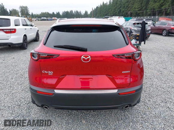 2023 Mazda CX-30 S Premium with VIN 3MVDMBDM1PM520048, listed as a IAAI auction lot 42468172 with 7,277 mi miles and . Bid and sale history available at DreamBid. Image 17.